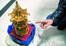 藏家买到假古董心生不满偷走43万元金佛塔
